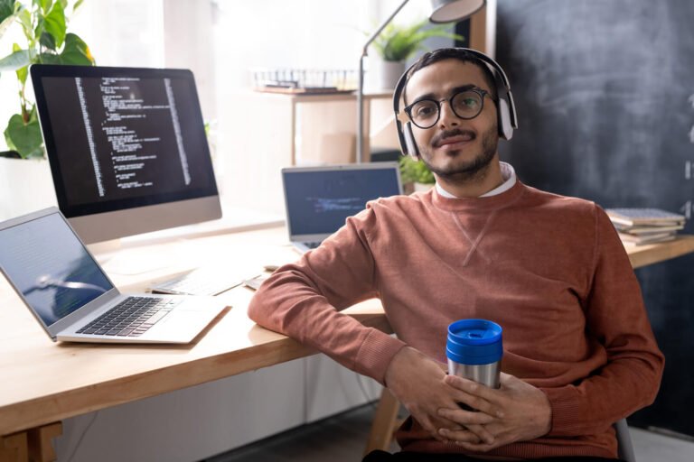 Handsome Programmer In Headphones Listening To Mus 2023 11 27 04 56 48 Utc 768x512